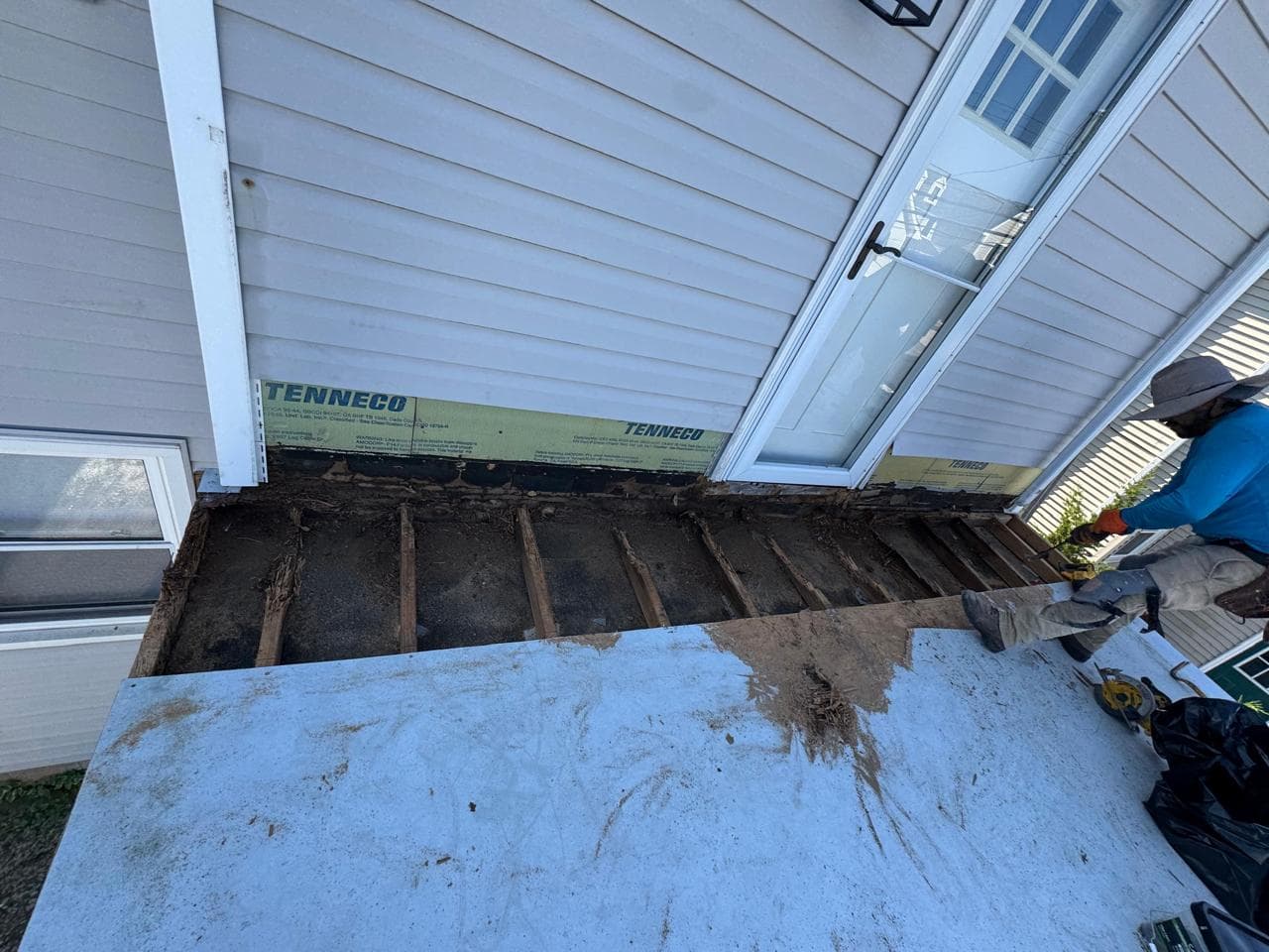 stone harbor nj fiberglass deck door pan leak repair before — soft spots and moisture damage