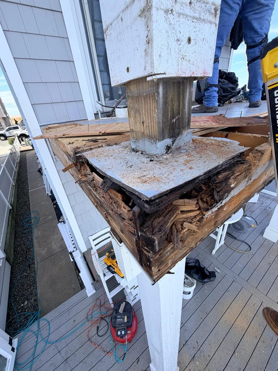 margate nj fiberglass deck railing post column repair before — structural rot from missing flashing