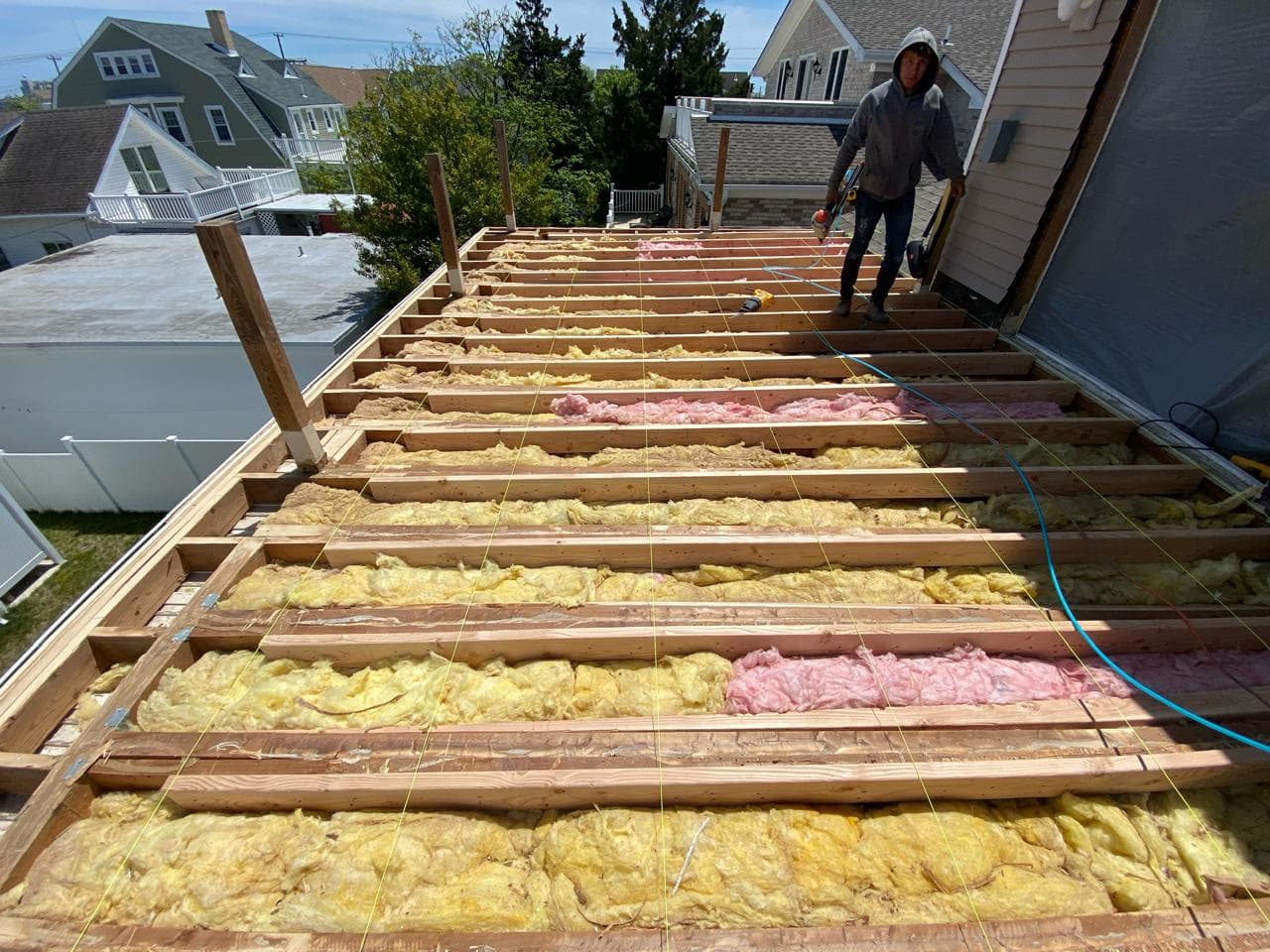 cape may nj fiberglass deck pitch correction before — reversed drainage pooling toward house